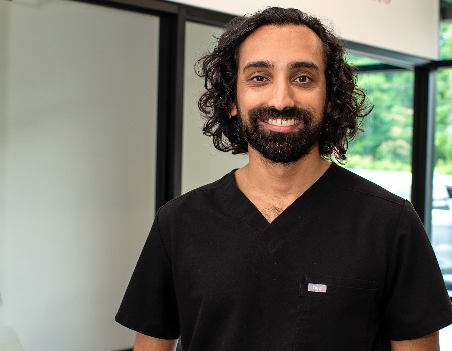 Dr. Karan Thachil's headshot