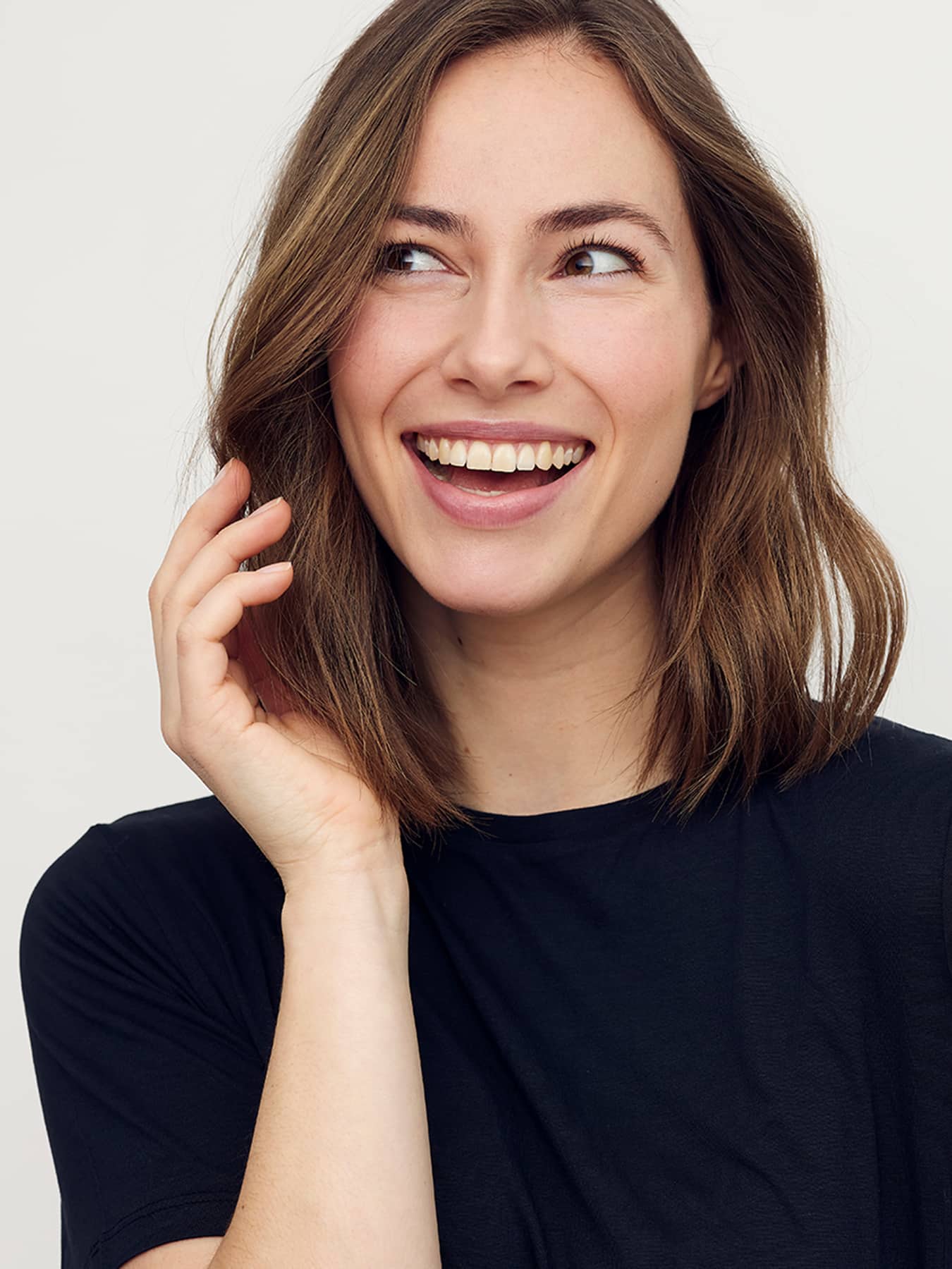 A young woman having a dental exam preformed AT esteem dental studio