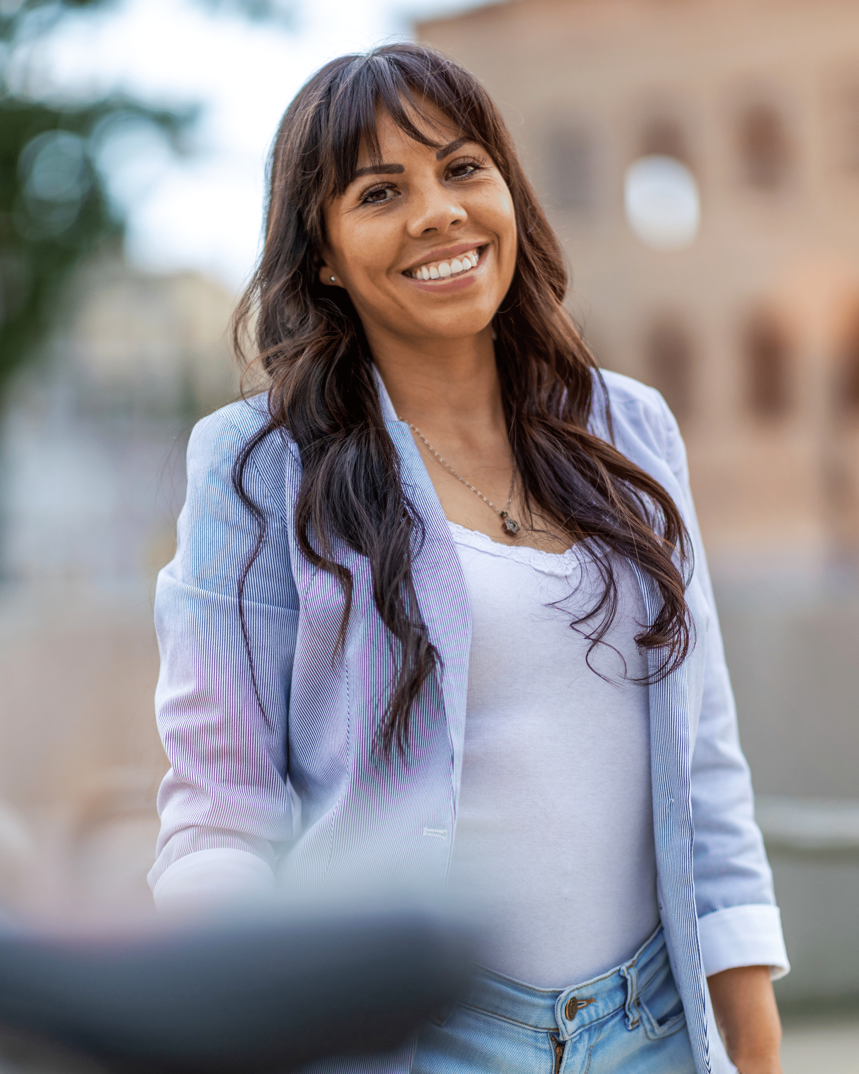 A young woman having a dental exam preformed AT esteem dental studio