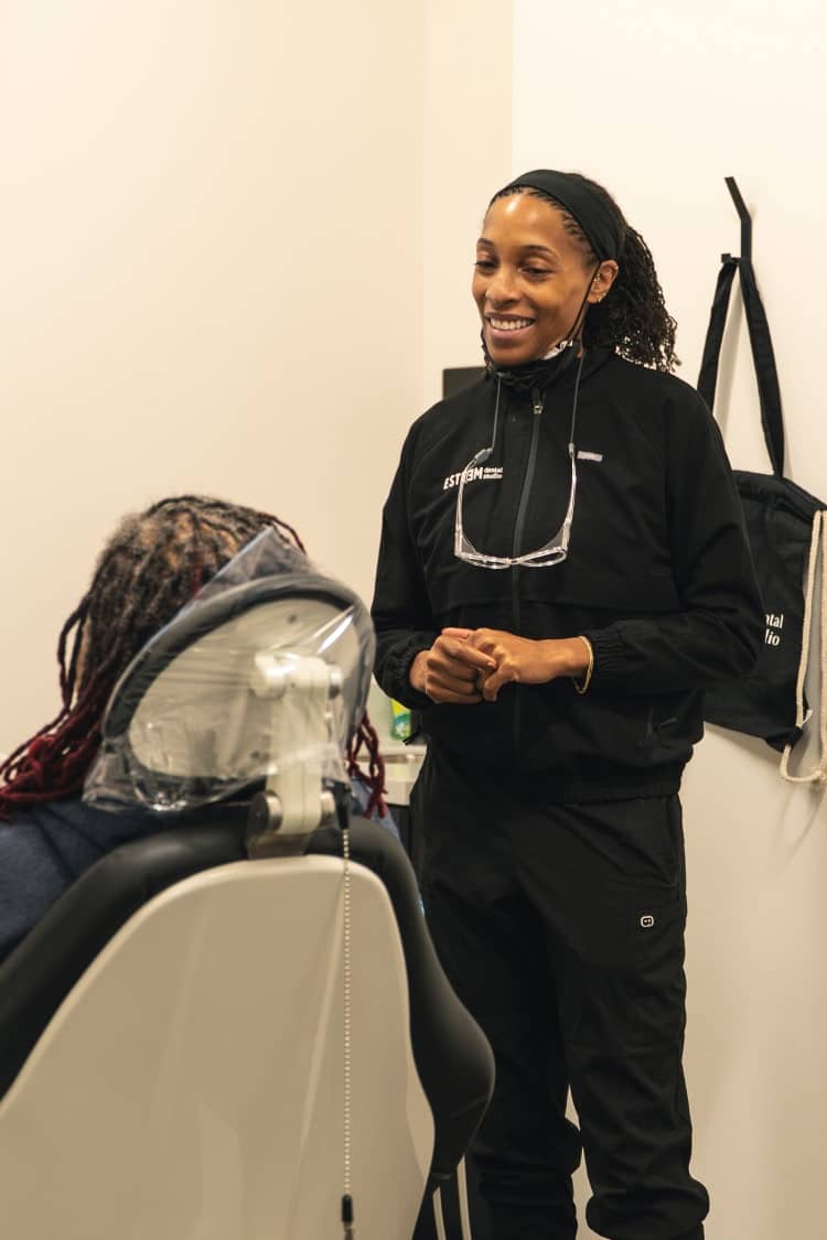 A young couple smiling outside together in powder springs ga