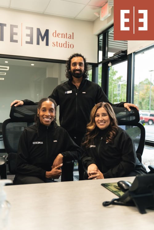 A young couple smiling outside together in powder springs ga