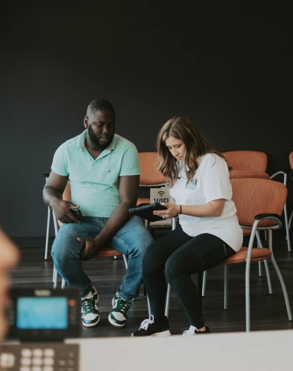 two young female friends laughing together outside in powder springs ga