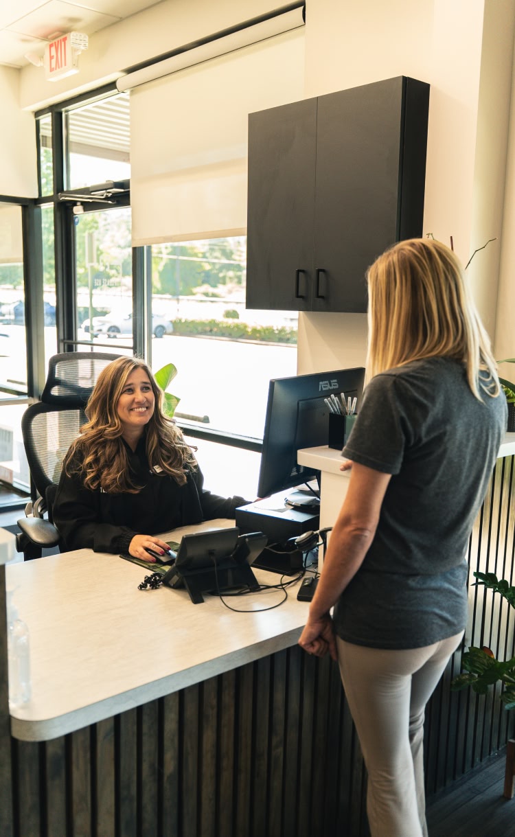 A close up of a young woman's smile after dental appointment at esteem dental studio