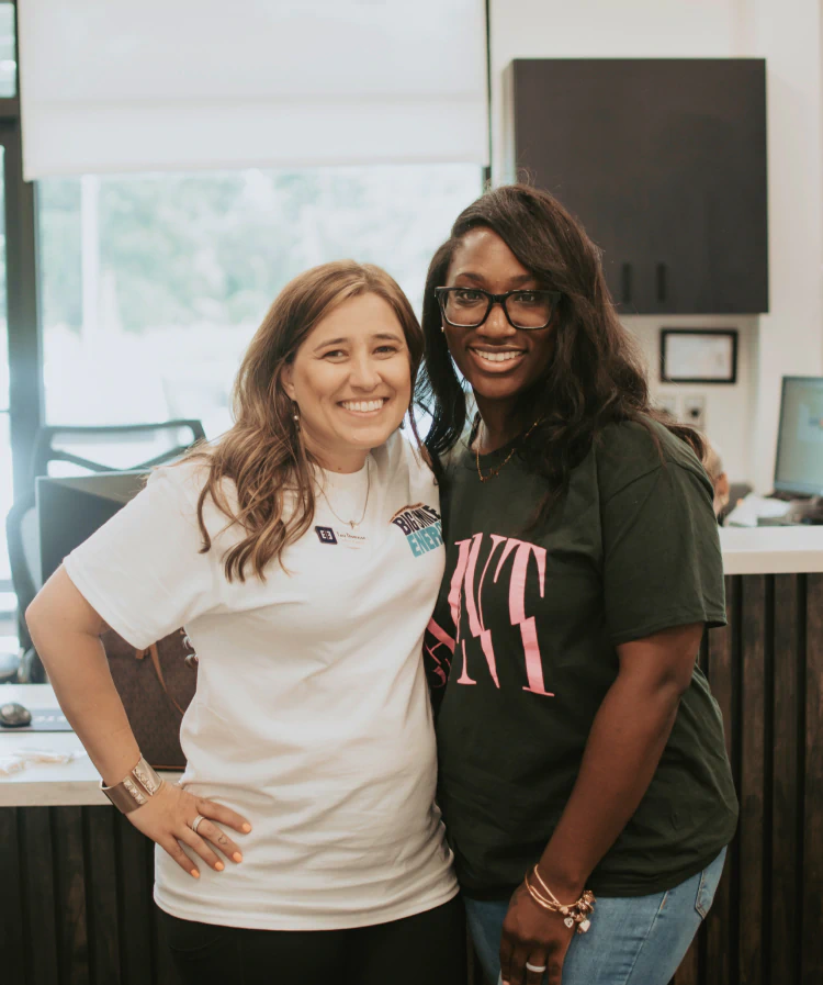A young woman having a dental exam preformed AT esteem dental studio