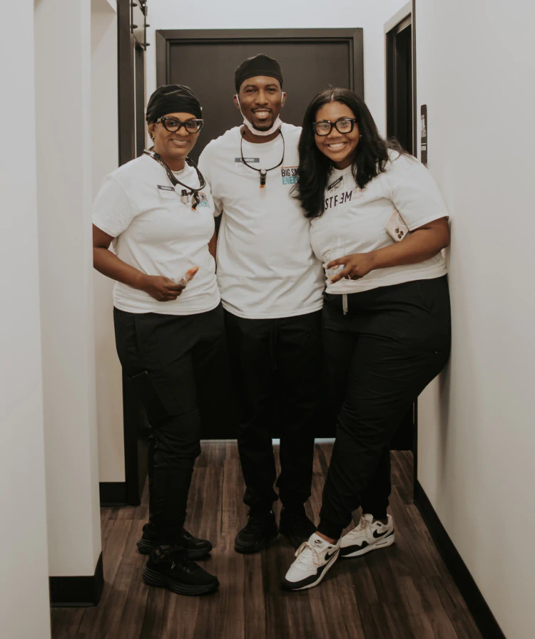 A young woman having a dental exam preformed AT esteem dental studio
