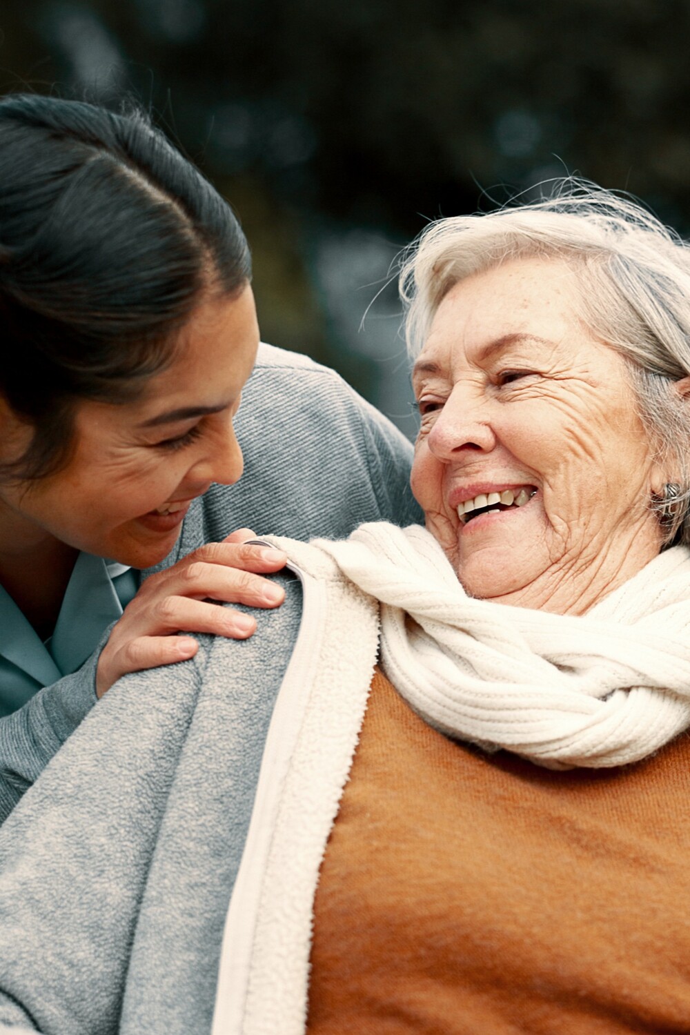Woman and her daughter celebrating after a successful single tooth implant in Powder Springs